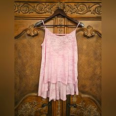 Free People Super Cute Strappy High Low Tank Top In Light Pink. This Semi Sheer Tank Has A Unique Strap Across The Back And A Ruffled Bottom Layer That Adds A Flirty Look To Your Workout Or Athleisure Time. Bundle And Save! Smoke Free, Hypoallergenic Dog Home Stretch Scoop Neck Vacation Tops, Stretch Scoop Neck Top For Vacation, Summer Tank Tops For Loungewear, Summer Cami Top For Layering, Summer Layering Cami Top, Pink Relaxed Fit Tank Top For Summer, Summer Loungewear Camisole Tops, Relaxed Fit Pink Tank Top For Summer, Pink Scoop Neck Top For The Beach