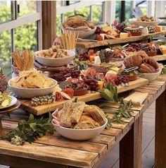 a table filled with lots of different types of food