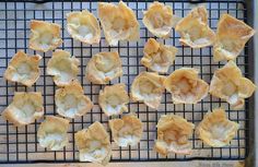 some food is sitting on a cooling rack and ready to be cooked in the oven