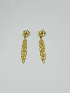 "This is a pair of vintage, 14K yellow gold dangle/drop earrings. They are relatively lightweight, making them extremely comfortable to wear. Material(s): 14K yellow gold Total weight: 2.5 grams Flaws (if any): None to mention Marking(s): \"14K\" Measurements: These earrings have a drop length of 1 and 3/4 inches, and they are 6.3 millimeters in width. If you have any questions about this pair of earrings, please do not hesitate to contact us! ♥" Elegant Yellow Gold Clip-on Dangle Earrings, Classic Gold Drop Chandelier Earrings, Gold Drop Chandelier Earrings For Anniversary, Yellow Gold Chandelier Earrings For Anniversary, Gold Long Drop Chandelier Earrings For Formal Events, Evening Yellow Gold Plated Chandelier Earrings, Formal Yellow Gold Dangle Clip-on Earrings, Classic Gold Chandelier Earrings For Anniversary, Yellow Gold Plated Long Drop Chandelier Earrings