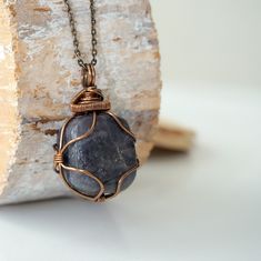 Nature-inspired Raw Stone Jewelry For Healing, Nature-inspired Raw Stone Healing Jewelry, Handmade Kyanite Healing Necklaces, Handmade Sodalite Healing Necklace, Bohemian Sodalite Necklace As Gift, Holistic Necklace With Raw Stone For Gift, Sapphire Pendant Necklace For Healing, Sodalite Pendant Necklace For Gift, Kyanite Necklace With Natural Stones For Gifts