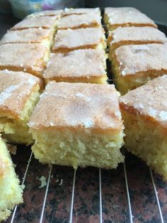 several pieces of cake cooling on a rack