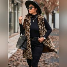 New Chic Leopard Print Faux Fur Sleeveless Long Vest * Sleeveless * Full Zip * Pockets * Lined 0xl (12) * Bust 46.5" * Length 34" 1xl (14) * Bust 48.75" * Length 34.5" 2xl (16) * Bust 51.25" * Length 35.25" 3xl (18) * Bust 53.5" * Length 36.25" 4xl (20) * Bust 56" * Length 37" In Transit ** Will Ship In Approx 7- 10 Days Color : Brown Black Tan Fabric : Poly #Spring Fall Winter Casual Dress Western Southwestern Boho Bohemian Preppy Pumpkin Spice Punk Nirvana 90's Y2k Casual Office Date Western B Chic Brown Winter Vest, Sleeveless Fall Outerwear, Chic Sleeveless Winter Vest, Chic Brown Sleeveless Sweater Vest, Edgy Western Style, Long Vest Sleeveless, Faux Fur Vests Outfits, Winter Casual Dress, Preppy Pumpkin