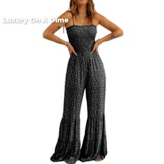 Retro Hippie Pant One-Piece Smocked Tiered Wide Leg Bell Bottom Jumpsuit Casual Boho Hippie Just Received A Upgrade With This One-Piece Romper Outfit. Beautiful Silhouette Thats Functional And Perfect For Everyday Wear. Sleeveless Self-Tie Spaghetti Shoulder Straps With A Square Neckline. Enhanced With A Super Stretchy Smocked Bodice That Extends Down To The Waist For A Flattering Fit On Any Body Shape. Comfy Style With Oversized Wide Leg Tiered Bell Bottom Trousers Pants Keep To That Vintage Vi Stretch Jumpsuits And Rompers With Smocked Back, Black Fitted Jumpsuits And Rompers For Vacation, Fitted Black Jumpsuits And Rompers For Vacation, Black Jumpsuits And Rompers With Elastic Waistband For Beach, Fitted Jumpsuits And Rompers With Smocked Back, Black Jumpsuits And Rompers With Smocked Back For Spring, Black Smocked Bodice Jumpsuits And Rompers For Spring, Casual Fitted Jumpsuit With Smocked Bodice, Black Smocked Bodice Jumpsuit For Spring