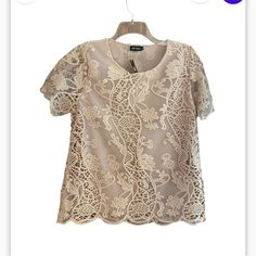 Coc Vintage Lace Blouse New With Tags, In Beautiful Condition Beautiful Lace Top With Lining. Sheer Lace Short Sleeves Color Is Beige, Almost Looks Like A Light Pink Size Listed As Xl. I’ve Included Measurements Of Pit Pit And Length. Bc. Beige Lace Tops For Spring, Elegant Beige Crew Neck Blouse, Chic Beige Lace Top, Summer Lace Blouse With Crew Neck, Beige Lace Top With Short Sleeves, Beige Short Sleeve Blouse With Lace Top, Beige Short Sleeve Lace Top Blouse, Beige Lace Top Short Sleeve Blouse, Elegant Cream Short Sleeve Top