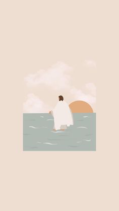 a man standing in the ocean with his arms outstretched