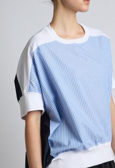 One size, fits XS-LColor: BlueWhite and Light Blue Striped FrontNavy Blue BackWhite Contrast PanelsLonger in back80% Cotton 20% NylonDry Clean or Hand Wash By The NKC StoreProduct Measurements:Bust: 147.32cm / 58inLength: 53.34cm / 21inSleeve Length: 22.86cm / 9inModel is 175cm / 5'9" wearing Size O/S Printed Women Shirts, Black Tank Dress, Blue Back, Boyfriend Tee, Knit Tank, Tie Top, Engineered Garments, Knitting Women, Knitted Tank Top