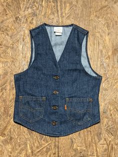 New Without Tags Vintage Kids 60's Levis Denim Vest... Ready To Wear Size M 10-12. Fits like a 8-10 PLEASE check measurements. Measurements: Pit to Pit: 13" Collar to Bottom: 14 1/4" Baby Jean Vest, Vintage Cotton Vest With Button Closure, Vintage Blue Denim Vest For Fall, Retro Denim Outerwear With Buttons, Classic Cotton Denim Vest With Pockets, Retro Vest With Pockets For Spring, Denim Vest With Snap Buttons For Fall, Vintage Blue Vest For Fall, Retro Cotton Denim Vest With Button Closure