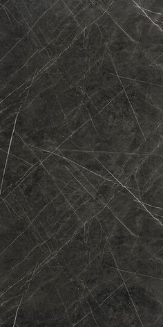 black marble textured with white lines on the top and bottom, as seen from above