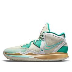 the nike zoom basketball shoe is shown in white and aqua green with gold trims