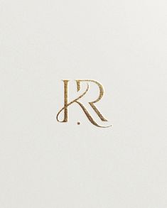 the letter k is made up of gold glitter