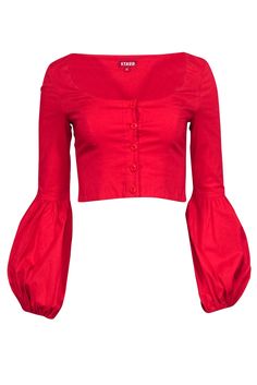 Add a pop of color to your wardrobe with Staud's Monica Top! Made from vibrant red cotton-poplin, this button-up top oozes bohemian charm with its flattering scoop neckline, voluminous cuffs, and cropped silhouette. Pairs perfectly with light wash denim and open-toe mules for a lovely look. Size XS 95% Cotton, 5% Spandex Button front Scoop neckline Cropped style Voluminous sleeves w/ elastic cuffs Bust 31" Waist 26" Shoulder to hem 15.5" Sleeve length 24.5" Red Fitted Cotton Tops, Red Trendy Button-up Tops, Trendy Red Button-up Tops, Bohemian Red Tops With Buttons, Red Trendy Blouse With Button Closure, Bohemian Red Button-up Top, Trendy Red Blouse With Buttons, Casual Spring Tops By Staud, Fitted Cotton Tops By Staud