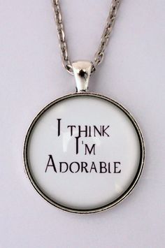 i think i'm adorable necklace with the words on it in black and white