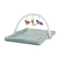 an inflatable bed with three toy animals hanging from it's back end