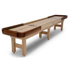 a long wooden table with two benches on the bottom and one bench at the top