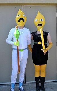 two people in costumes standing next to each other