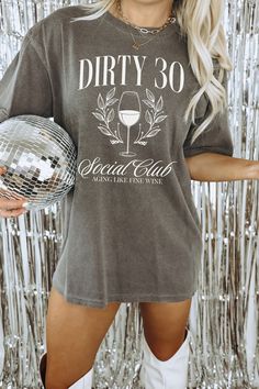 Celebrate your 30s in style with our fun and trendy Dirty 30 Social Club t-shirt! Perfect for a milestone birthday, this trendy tee is designed to capture the spirit of turning 30! DETAILS * Comfort Colors Garment-Dyed Heavyweight T-Shirt * 100% ring spun cotton * Design is printed using DTG technology which uses high-quality water-based inks that are printed directly into the fabric. This means that there may be a slightly faded/vintage look to the design depending on the color and fabric of the garment. SIZING * These unisex T-shirts are true-to-size with a relaxed fit. * Most women find their typical size works best since they are meant to be a bit loose fitting. * Some women size down for a tighter fit. * If you would like a more oversized look, we recommend sizing up 1 or 2 sizes (2-3 Birthday Shirt For Women, 30th Birthday Ideas For Women, 30th Birthday Shirts, 30th Birthday Gift, Wine Shirt, Turning 30, Dirty Thirty, Dirty 30, Wine Shirts