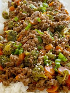 a plate with rice, broccoli and ground beef on it next to white rice