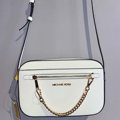 9.5”L, 6.5”T, 2”D White And Gold Michael Kors Crossbody Brand New With Tags! White Michael Kors Shoulder Bag With Branded Hardware, Michael Kors White Shoulder Bag With Branded Hardware, Michael Kors Modern White Shoulder Bag, Modern Michael Kors White Shoulder Bag, Modern White Michael Kors Shoulder Bag, Michael Kors White Shoulder Bag With Gold-tone Hardware, Classic White Michael Kors Shoulder Bag, Michael Kors White Shoulder Bag With Chain Strap, Classic White Shoulder Bag With Chain Strap