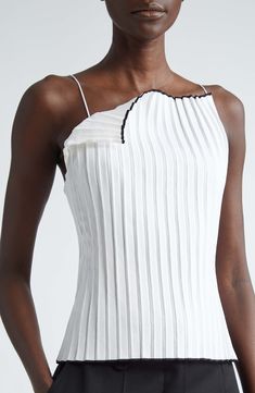 Contrast trim traces the hem and the winking asymmetric neckline on this pleated knit camisole topped with spaghetti straps and detailed with a D-ring at back. 20" length (size 42 FR) Asymmetric neck Spaghetti straps 73% viscose, 19% polyamide, 5% polyester, 3% elastane Dry clean Made in Portugal Designer Clothing Elegant One-shoulder Fitted Tank Top, Elegant Fitted Asymmetrical Tank Top, Elegant One-shoulder Tank Top For Evening, Elegant One Shoulder Tank Top For Evening, One-shoulder Tank Top For Evening In Spring, Elegant Asymmetrical Summer Tank Top, One Shoulder Tank Top For Evening In Spring, Spring Evening One Shoulder Tank Top, Fitted Tank Top With Asymmetrical Neckline For Evening