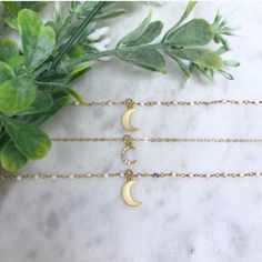 I Have Two Available Of The Following: 24k Gold Electroplated Natural Howlite Bead Stone Chain With Plain 18k Gold Plated Moon. I Have One Available Of The Following: 18k Gold Plated Simple Chain With 18k Gold Plated Pave Moon. All Necklaces Finished With Simple Sanctuary’s 18k Gold Plated Logo Charm. Approximately 15” Chains On All. Handmade In Texas. All Pictures Courtesy Of Simple Sanctuary. Price Is For One Necklace Of Your Choice. Celestial Gold Jewelry With Round Beads, Gold Jewelry With Moon Charm And Round Beads, Gold Necklaces With Moon Charm And Round Beads, Dainty Gold Moon Bracelets, Gold Crescent Bracelets With Moon Charm, Dainty Moon-shaped Gold Bracelets, Minimalist Rose Gold Necklace With Moon Charm, Gold Crescent Bracelet With Moon Charm, Dainty Moon-shaped Charm Necklaces For Gifts