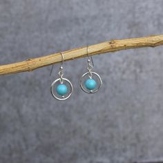 ✦ Get ready to bathe in all the compliments with these must-have turquoise earrings! With its unique beaded silver design, this pair of earrings is the perfect accessory that will add a touch of effortless bohemian chic to any outfit. Whether you are looking for everyday accessories or a special gift for that one person in your life, you won't go wrong with these stylish and creative turquoise earrings. Stick them on and embrace the fun vibes! 💎  Please Note As with all Natural Gemstones The co Nickel Free Sterling Silver Beaded Earrings, Nickel-free Round Sterling Silver Beaded Earrings, Turquoise Circle Earrings Gift, Hypoallergenic Sterling Silver Beaded Earrings, Turquoise Round Beaded Earrings With Ear Wire, Sterling Silver Beaded Earrings, Nickel-free Turquoise Beaded Earrings In Sterling Silver, Turquoise Sterling Silver Hypoallergenic Beaded Earrings, Minimalist Beaded Round Earrings