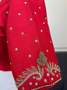 Bright Red Color Raw Silk Readymade Blouse with beautiful Handwork Work in beads and Zircon. Item : Readymade BlouseReady-to-Wear : YesSize : 36 (Can be opened to Size 40)Color : Bright Red Blouse Fabric : Soft Silk Lining : Yes, it is fully lined Padded or Non-Padded : PaddedClosure: Front Closure with hooks.Disclaimer - : -This is a Standard Size blouse. We do not guarantee perfect fit as every body and shape is different. Little or no alteration would be required to get the perfect fit. - Col Blouse Handwork, Padded Blouse, Color Blouse, Readymade Saree, Saree Blouses, Red Blouse, Readymade Blouse, Blouse Fabric, Red Blouses