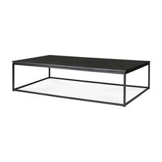 a black coffee table sitting on top of a white floor