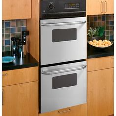 two ovens side by side in a kitchen