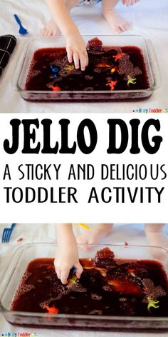 a toddler is playing with jello - dip in a plastic container