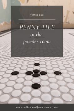 the penny tile in the powder room with text overlay that reads, penny tile in the powder room