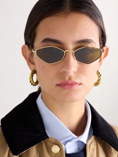 Miu Miu's hexagon-frame sunglasses will make any outfit feel instantly cooler. Made from gold-tone metal, they're carved with the label's logo at the temple and have comfortable tortoiseshell-effect acetate tips. Adjust the nose pads to perfect the fit. Miu Miu Sunglasses Outfit, Miu Miu Eyeglasses, Miu Miu Eyewear, Statement Sunglasses, Denim Flats, Miu Miu Sunglasses, Brown Lens, Dior Sunglasses, Sunglasses Brand