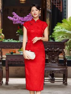 This stunning qipao features a luxurious red silk fabric with a delicate floral jacquard pattern.. The high mandarin collar and traditional frog button closure at the neck give it a classic Chinese silhouette, while the cap sleeves enhance the refined, feminine look. perfect for formal occasions, weddings, or special events. Material: 40% Mulberry Silk, 60% Viscose Size Guide: Dress Length: 120cm Please note Asian size runs small, please check our size chart in the picture before placing the ord Red Traditional Cheongsam For Evening, Traditional Red Cheongsam For Evening, Elegant Red Cheongsam, Traditional Red Cheongsam For Formal Occasions, Elegant Cheongsam With Stand Collar For Festive Season, Elegant Festive Cheongsam With Stand Collar, Elegant Red Cheongsam With Stand Collar, Elegant Red Ao Dai With Stand Collar, Elegant Red Cheongsam For Evening