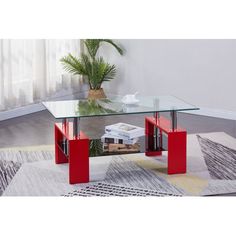 a glass table sitting on top of a rug