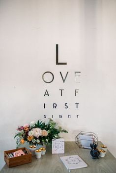 an instagram photo with the words love at first sight and flowers in front of it