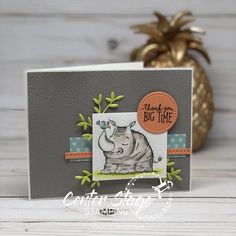 a card with an image of a rhino on it and the words happy big time