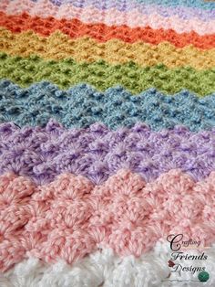 a multicolored crocheted blanket is shown