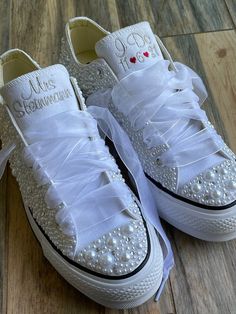 Platform Converse with Rhinestones & white mixed pearls encrusted all over the shoe. !  I can do white pearls or all ivory. (I will do the white unless you ask for something else )I can also do black on black shoes. I can change the personalization too !These shoes will sparkle and get noticed across the room! They are beautifully embroidered and hand done and each pair will be a bit different.This listing shows the I Do pattern but I can put your name or monogram on them as well as the date Elegant Embellished Sneakers For Wedding, Embellished White Wedding Shoes For Bridal Shower, Converse With Rhinestones, Low-top Bride Wedding Shoes With Rhinestones, Wedding White Embellished Sneakers, Wedding Custom Sneakers With Rhinestones And Round Toe, Low-top Wedding Shoes With Rhinestones For Bride, Bride's Low-top Wedding Shoes With Rhinestones, Embellished Low-top Wedding Sneakers