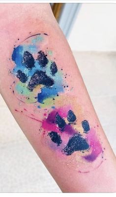 a colorful paw print on the arm