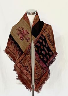 "Effortlessly transform a simple look into chick look with this natural wool and silk blend reversible Jacquard shawl/scarf.  This paisley pattern shawl/scarf in shades of Black,Orange red, Beige and purple. This shawl has been expertly hand woven in Kashmir, using traditional techniques, to bring you a truly beautiful, timeless traditional paisley Jacquard shawl you will use time and time again. Use this shawl in any way such as a shawl/wrap/scarf during the winter, a piece of decor for the hou Bohemian Brown Shawl Dupatta, Brown Shawl Dupatta, Elegant Multicolor Shawl For Fall, Elegant Multicolor Fall Shawl, Winter Paisley Print Pashmina Scarf, Winter Paisley Print Pashmina Scarves, Brown Pashmina Scarves For Winter, Winter Pashmina Scarf With Paisley Print, Brown Shawl Wrap One Size