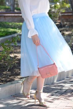 Light blue Fully lined Elastic waist Full skirt Paired with our Suzy top Modeled in medium 5'6" 100% Polyester Small (waist 28-36”/length 29" (lining) 32" (tulle)) Medium (waist 30-38”/length 29" (lining) 32" (tulle)) Large (waist 32-40”/length 29" (lining) 32" (tulle)) Blue Long Tulle Skirt, Blue Flared Tulle Skirt, Blue Tulle Long Skirt, Blue Full Tulle Skirt, Blue Tulle Skirt For Summer, Feminine Pleated Tulle Skirt, Spring Party Tulle Skirt, Feminine Spring Petticoat For Party, Feminine Spring Party Petticoat