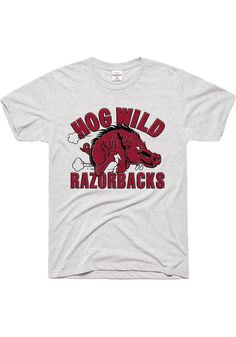 Support your Arkansas Razorbacks in this Ash Short Sleeve Fashion Tee! This Hog Wild Fashion T Shirt features a screen print of Hog Wild Razorbacks arched around Razorback. Be ready to shout "Woo Pig Sooie" when you wear this Arkansas Short Sleeve Fashion T Shirt in the stadium or on the street. Super soft triblend, Short Sleeve, Unisex, Locally made!, Screen print graphic, Fit: True to Size, 50% Polyester 38% Cotton 12% Rayon, 1 Razorback Shirt, Woo Pig Sooie, Wild Fashion, University Of Arkansas, Arkansas Razorbacks, Grey T Shirt, Sleeve Fashion, Fashion T Shirt, Print Graphic