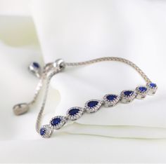 This adjustable silver bracelet, featuring a stunning blue sapphire, offers both elegance and style. Sapphire, the birthstone for September, is known as a symbol of wisdom and loyalty. It makes a meaningful gift for special occasions like Mother's Day or anniversaries. Designed to complement both everyday wear and special moments, this bracelet is a timeless accessory that suits every style. weight: 7.72g * Handmade with love ♡ * Material: 925 Sterling Silver * Standard Bracelet Length: 16 + 4cm Elegant Sapphire Sterling Silver Bracelet As Gift, Adjustable Blue Birthstone Bracelets, Adjustable Blue Bracelet With Birthstone, Adjustable Blue Bracelets With Birthstone, Adjustable Sapphire Bracelets For Wedding, Sapphire Bracelet For Anniversary, Adjustable Sapphire Bracelet Jewelry, Adjustable Sapphire Gemstone Jewelry, Adjustable Sapphire Jewelry For Anniversary