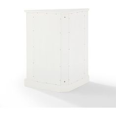 a white cabinet sitting on top of a white floor