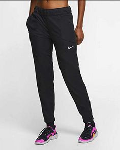 Nike Shield Dri-Fit Women Running Pants Black BV3311 010  100% Authentic, Brand New with tag Women Size: Medium - Large Style # BV3311 010 Product Details: The Nike Shield Pants are your go-to for allover coverage. Get after it regardless of wind or rain in soft, smooth fabric. Nike Shield fabric resists elements like wind and water. It's made of a medium weight knit fabric that feels soft and smooth. The slim fit tapers towards the bottom for a snug fit around your ankles to help keep the cold Nike Tapered Leg Sports Bottoms, Nike Jogging Pants With Elastic Waistband, Black Straight Leg Jogging Bottoms, Black Straight Leg Bottoms For Jogging, Nike Athleisure Tapered Leg Bottoms, Nike Tapered Leg Athleisure Bottoms, Nike Functional Bottoms With Hip Pockets, Nike Workout Bottoms With Pockets, Sports Pants With Hip Pockets And Tapered Leg