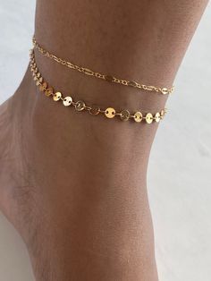 14k Gold Filled sequin anklet. Dainty, minimalist jewelry that can be layered with multiple jewelry styles and designs. Beautifully worn day or night! It is the perfect gift for mom, daughter, friend or just you! Don't wait to purchase! Handmade with 14k Gold Filled material.  Please note that jewelry color may vary slightly from image due to computer quality.  Also, please note that each item is handmade, which makes each piece uniquely designed for you! DETAILS: 4mm  gold filled sequin discs 14k Gold filled chain and clasp Each purchase comes ready for gifting! Also, I try very diligently to have each order shipped ASAP as I know how important delivery is to everyone! Gold Ankle Wrap Bracelets For Summer, Dainty Gold Ankle Wrap Bracelets, Gold Adjustable Ankle Wrap Anklet, Gold Dainty Ankle Bracelet, Gold Ankle Wrap Bracelet For Summer, Summer Gold Ankle Wrap Bracelets, Summer Ankle Wrap Gold Bracelets, Adjustable Gold Ankle Wrap Anklet, Gold Party Bracelet Anklets