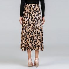 Gender: Women Waistline: Natural Model Number: skirt180730401 Material: Polyester Silhouette: Asymmetrical Dresses Length: Mid-Calf Pattern Type: Leopard Decoration: NONE Style: Casual Fabric : Fabric has no stretch Color: coffee UID: 180823237 Style: Casual Silhouette: Shift Season: Summer Waist Type: Mid Waist Material: 100% Polyester Length: Mid-Calf Occasion: Weekend Casual Decoration: Knot Pattern Type: Leopard Knotted Skirt, Knot Skirt, Leopard Print Fashion, Leopard Print Skirt, Womens Pencil Skirts, Elegant Skirt, Fashion Group, Fall Skirts, Skirts Online