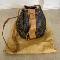 Authentic Rare Fendi Brown Zucca Ff Drawstring Bucket Bag. Medium. Will Come With Pictured Authentic Fendi Dust Bag. See All Pics And Vid For Measurements And Conditions. Fendi Bucket Bag, Fendi Bucket, Drawstring Bucket Bag, Fendi Bags, Bucket Bag, Dust Bag, Fendi, Bag Lady, Size Medium