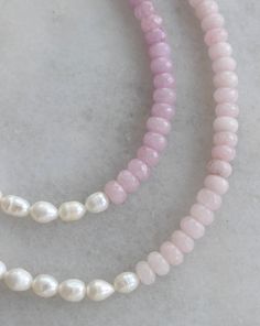 All things sweet & pearl! Choose from two gorgeous hues of pink and purple jade beads, split with real, freshwater pearls. Adjustable 15-17in. Finished off with 14K gold filled materials. Nickel and lead free. Pink Pearl Drop Beaded Necklaces With Round Beads, Pink Beaded Necklaces With Pearl Charm, Pink Pearl Beaded Necklace With Pearl Charm, Pink Pearl Necklace With Natural Round Beads, Pink Pearl Necklace With Round Beads, Pink Pearl Jewelry With Gemstone Beads, Pink Pearl Necklace With Round Natural Stones, Dainty Pink Pearl Beaded Necklaces, Pink Pearl Chain Beaded Necklaces With Round Beads