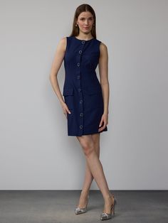 Classic Sleeveless Shirt Dress For Work, Classic Sleeveless Dress With Pockets, A-line Mini Dress With Pockets For Work, Classic Button Back Dress For Work, Elegant Sleeveless Mini Dress With Pockets, A-line Mini Dress With Pockets For Formal Occasions, A-line Mini Dress With Pockets For Formal Events, Classic Dresses For Workwear With Button Back, Classic Dresses For Work With Button Back